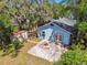Aerial view showcases the backyard patio and storage shed at 5806 N 9Th St, Tampa, FL 33604