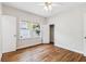 Bedroom with hardwood floors and a ceiling fan at 5806 N 9Th St, Tampa, FL 33604