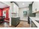 Well-lit kitchen with updated appliances and stylish backsplash at 5806 N 9Th St, Tampa, FL 33604