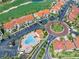 Aerial view of condos surrounding pool, parking, and streets at 6171 Bahia Del Mar Blvd # 216, St Petersburg, FL 33715