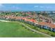 Community aerial view showcases the beautiful condos, green spaces, and manicured landscaping at 6171 Bahia Del Mar Blvd # 216, St Petersburg, FL 33715