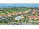 Aerial view of condos with a pool, golf course, and convenient access to nearby attractions at 6171 Bahia Del Mar Blvd # 216, St Petersburg, FL 33715