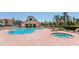 Stunning community pool and spa area with plenty of seating for relaxing and socializing at 6171 Bahia Del Mar Blvd # 216, St Petersburg, FL 33715