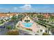 Aerial view showcasing the community pool, clubhouse, and surrounding residential area at 6171 Bahia Del Mar Blvd # 216, St Petersburg, FL 33715