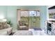 Living room view leading to patio overlooking the grounds at 6171 Bahia Del Mar Blvd # 216, St Petersburg, FL 33715