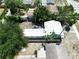 This aerial shot highlights the property's backyard and well-kept exterior, accentuated by mature landscaping at 627 64Th S Ave, St Petersburg, FL 33705