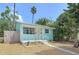 Charming single-story home featuring a quaint front porch and tidy landscaping at 627 64Th S Ave, St Petersburg, FL 33705