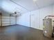 Spacious garage with epoxy flooring and modern door opener at 627 64Th S Ave, St Petersburg, FL 33705