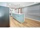 Kitchen featuring a large island with quartz countertop and lots of cabinet space at 627 64Th S Ave, St Petersburg, FL 33705