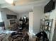 Bedroom featuring tile floors and a workspace with a desk and black chair at 701 54Th S St, Gulfport, FL 33707