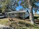 Charming single-story home with mature trees in a quiet, residential neighborhood at 701 54Th S St, Gulfport, FL 33707