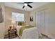 Comfortable bedroom showcasing natural lighting and a spacious closet at 8277 82Nd N Ave, Largo, FL 33777
