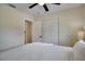 Cozy bedroom featuring ample closet space, overhead fan, and plenty of light at 8277 82Nd N Ave, Largo, FL 33777