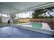 Spacious screened lanai offering views of the pool and backyard at 8277 82Nd N Ave, Largo, FL 33777