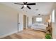 Spacious main bedroom with a walk-in closet and a ceiling fan at 8277 82Nd N Ave, Largo, FL 33777