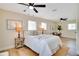 Comfortable main bedroom featuring a ceiling fan, neutral decor, and natural light at 8277 82Nd N Ave, Largo, FL 33777