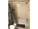 Full bathroom featuring a tub with shower, toilet, and tile flooring at 860 Virginia St # 308, Dunedin, FL 34698