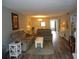Spacious living room with wood flooring and comfortable seating at 860 Virginia St # 308, Dunedin, FL 34698