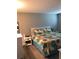Comfortable main bedroom featuring a queen-sized bed and neutral decor at 860 Virginia St # 308, Dunedin, FL 34698