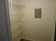 Spacious pantry featuring adjustable metal shelving providing ample storage space at 860 Virginia St # 308, Dunedin, FL 34698