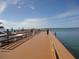 Community fishing pier with views of boats on the water at 860 Virginia St # 308, Dunedin, FL 34698