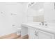 Bathroom featuring vanity with seating area and a toilet at 10563 Laguna Plains Dr, Riverview, FL 33578
