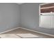 Bedroom featuring tile floors, a bright window and neutral walls at 11307 Calgary Cir, Tampa, FL 33624