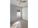 Neutral bedroom features tile floors, a closet and a bright window at 11307 Calgary Cir, Tampa, FL 33624