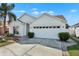Attractive single-Gathering home with a two-car garage and manicured landscaping at 11307 Calgary Cir, Tampa, FL 33624