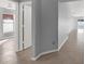 Hallway view with access to bedrooms and living spaces at 11307 Calgary Cir, Tampa, FL 33624
