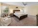 Spacious main bedroom with large windows and comfortable furnishings at 12607 Flatwood Creek Dr, Gibsonton, FL 33534