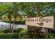 LaBelle of Largo community sign with palm trees and landscaping at 12900 Vonn Rd # F101, Largo, FL 33774