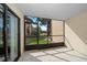 Enclosed lanai with tiled flooring, offering an enjoyable outdoor space to relax and unwind at 12900 Vonn Rd # F101, Largo, FL 33774