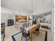 Open dining area connects kitchen, living room, and features backyard views with bright natural light at 13209 Palmilla Cir, Dade City, FL 33525