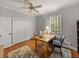 Office with hardwood floors, closet, and window at 13209 Palmilla Cir, Dade City, FL 33525
