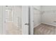 Walk-in closet includes shelving and carpeted floor at 13233 Canopy Creek Dr, Tampa, FL 33625