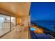Balcony with beach view and outdoor seating adjacent to the condo's interior living space at 15000 Gulf Blvd # 602, Madeira Beach, FL 33708