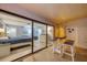 Cozy balcony with seating area, offering a glimpse into the bedroom with comfortable furnishings at 15000 Gulf Blvd # 602, Madeira Beach, FL 33708
