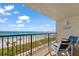 Relax on the balcony with a beautiful view of the beach and ocean at 15000 Gulf Blvd # 602, Madeira Beach, FL 33708