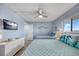 Well-lit bedroom featuring two twin beds and a view of the outdoors at 15000 Gulf Blvd # 602, Madeira Beach, FL 33708