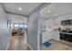 An efficient kitchen and views of the living room and ocean at 15000 Gulf Blvd # 602, Madeira Beach, FL 33708