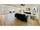 Bright and open living room featuring new floors, recessed lighting, and an electric fireplace at 15307 Stonecreek Ln, Tampa, FL 33613