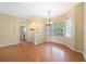 Cozy dining area featuring wood-look flooring and sunlit windows at 1744 Brookstone Way, Plant City, FL 33566