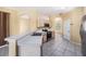 Functional kitchen features laminate counters and stainless steel appliances at 1744 Brookstone Way, Plant City, FL 33566