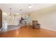 Inviting living space with bamboo floors, open to kitchen and cozy seating at 1744 Brookstone Way, Plant City, FL 33566