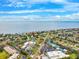 Attractive aerial view of a coastal community with commercial buildings and a long stretch of waterfront at 1810 Maryland Ne Ave, St Petersburg, FL 33703
