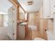 Bathroom with vanity, mirror, and shower-tub combination ready for renovation at 1810 Maryland Ne Ave, St Petersburg, FL 33703
