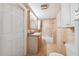 Bathroom with vanity, mirror, and shower-tub combination ready for renovation at 1810 Maryland Ne Ave, St Petersburg, FL 33703