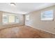 Bedroom with natural light, bay window, and underlayment flooring ready for remodel at 1810 Maryland Ne Ave, St Petersburg, FL 33703