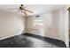 Bedroom featuring black wood floors, natural light, and closet at 1810 Maryland Ne Ave, St Petersburg, FL 33703